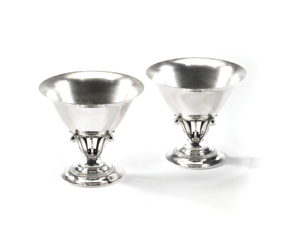 A PAIR OF DANISH SILVER BOWLS, GEORG JENSEN,: A PAIR OF DANISH SILVER BOWLS, GEORG JENSEN, COPENHAGEN, CIRCA 1930 17A pattern designed by Johan Rohde in 1912, circular bases rising to openwork berry and leaf stems and everted rim bowls, import ma