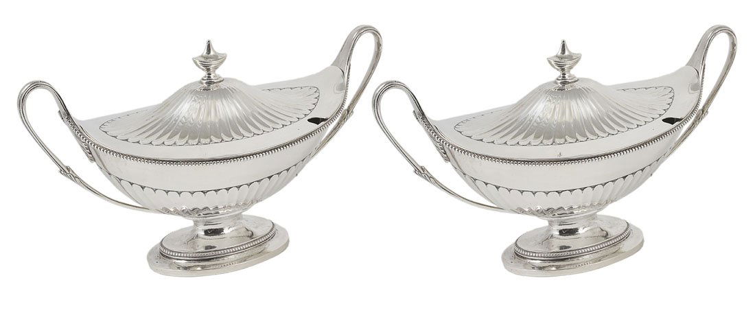 A PAIR OF VICTORIAN SILVER SAUCE TUREENS AND COVERS,: A PAIR OF VICTORIAN SILVER SAUCE TUREENS AND COVERS, CHARLES STUART HARRIS, LONDON, 1898 in late 18th century style, fluted boat-shaped with applied beaded borders, pedestal feet, finials mirroring th