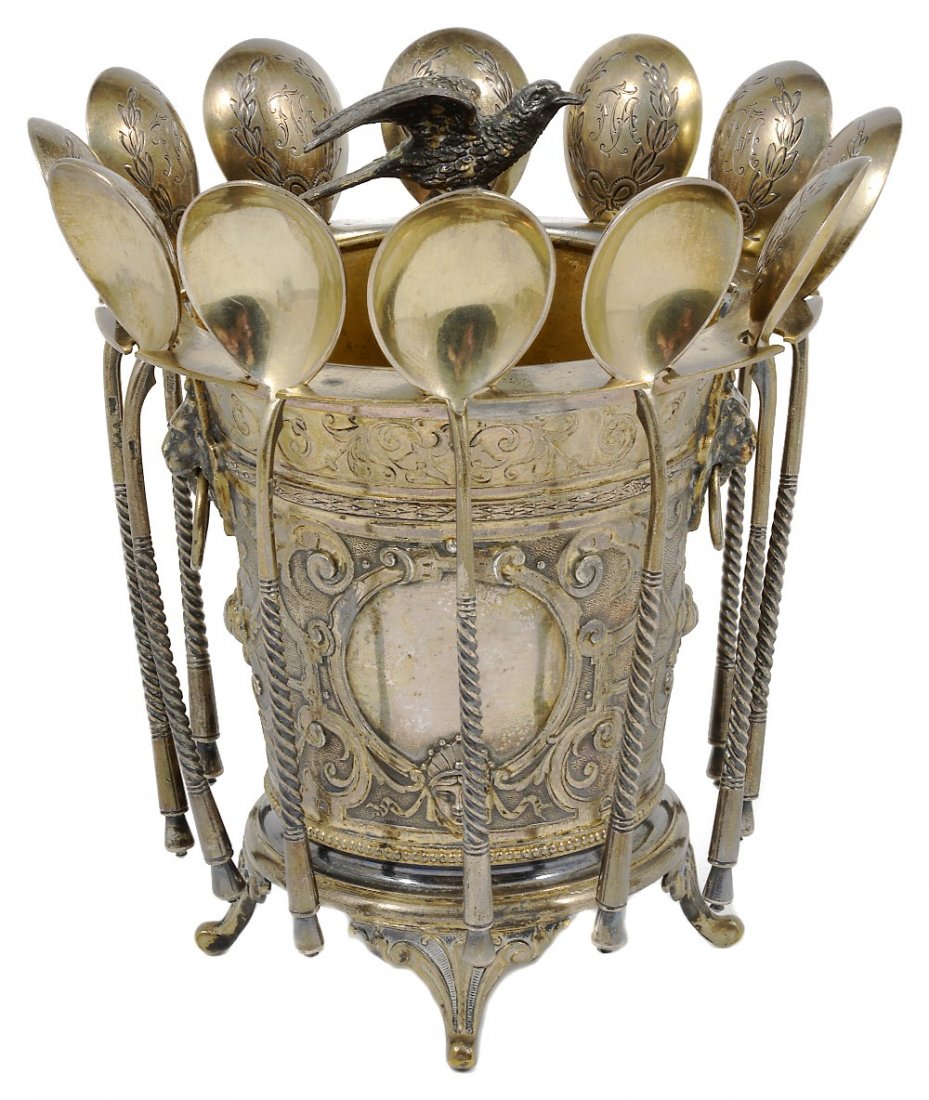 A SET OF TWELVE RUSSIAN SILVER-GILT TEASPOONS, MAGRENA: A SET OF TWELVE RUSSIAN SILVER-GILT TEASPOONS, MAGRENA ANDREEVIA ANDREEVA, MOSCOW, 1908-17 with spiral twist stems, the bowls frosted to the reverse and engraved with scrolling initials in a ribbon-ti