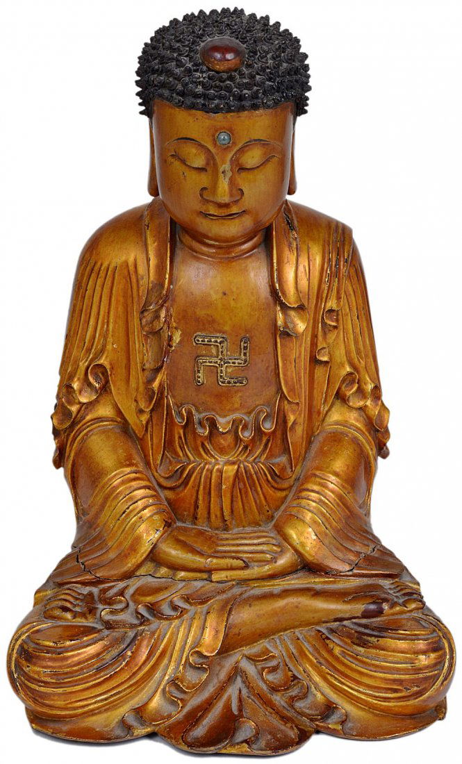 A CHINESE LACQUERED WOOD FIGURE OF BUDDHA, QING DYNASTY: A CHINESE LACQUERED WOOD FIGURE OF BUDDHA, QING DYNASTY wearing voluminous robes, a svastika symbol on his chest 27.5cm high excluding wood stand