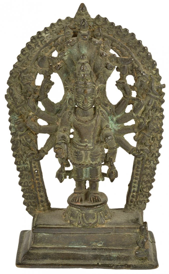 A BRONZE FIGURE OF AVALOKITESVARA, NEPAL, 17TH/18TH: A BRONZE FIGURE OF AVALOKITESVARA, NEPAL, 17TH/18TH CENTURY the multi-armed deity standing on a lotus throne under a seven-headed cobra canopy within a flaming aureole, a diminutive figure of a devote