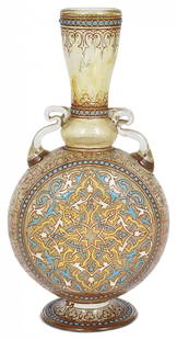 A FRENCH ENAMELLED GLASS MAMLUK STYLE FLASK,: A FRENCH ENAMELLED GLASS MAMLUK STYLE FLASK, PHILIPPE-JOSEPH BROCARD, PARIS, CIRCA 1880 flattened moon form, the amber tinted glass body enamelled in turquoise, white and red and gilded with arabesque