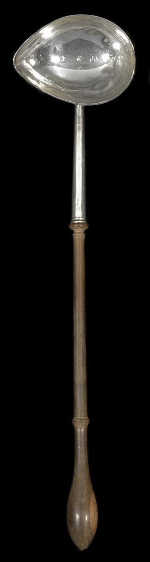A GEORGE II SILVER PUNCH LADLE, JAMES SMITH, LONDON,: A GEORGE II SILVER PUNCH LADLE, JAMES SMITH, LONDON, 1735 the otherwise plain pear-shaped bowl engraved with the initials 'W/H*S' and 'SW=L' 34.7cm. long, 80gr (2oz) including turned fruitwood handle