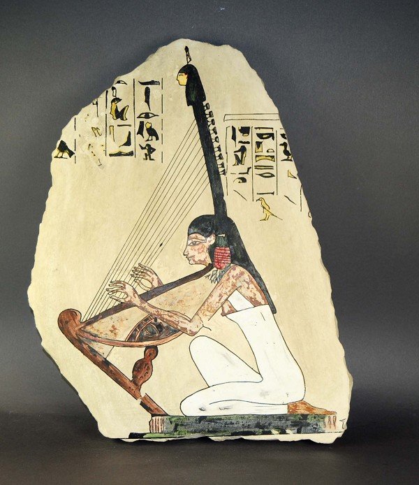 Limestone plateau, with harpist Hiroglyphen, H = 49.0,: Limestone plateau, with harpist Hiroglyphen, H = 49.0, W = 37.0 cm Kalksteintafel, Harfenspielerin mit Hiroglyphen, H = 49,0, B = 37,0 cm