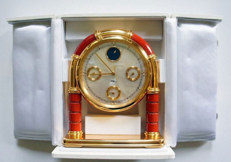 Clock Imhof, with moon phase, metal-plated, mother: Clock Imhof, with moon phase, metal-plated, mother of pearl dial with semi-precious stones, quartz movement, 70s Tischuhr von Imhof, mit Mondphase, Metall vergoldet, Perlmutt-Zifferblatt mit Halbedels
