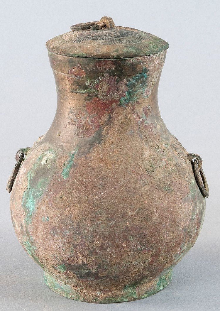 Pot with lid, China, Han Dynasty (206 BC to 220 AD), br: Pot with lid, China, Han Dynasty (206 BC to 220 AD), bronze with verdigris patina and irregular buildup of locality patina, two side taotie masks with small handles, cover with line decor and four so-