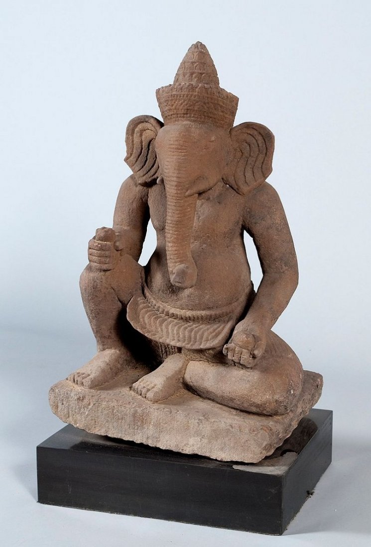 Sculpture of the deity Ganesha in Virasana, Cambodia, i: Sculpture of the deity Ganesha in Virasana, Cambodia, in Khmer, Koh ker-period (10th cent. AD), reddish sandstone finely drawn, detailed representation. Insignificant reduction in the base, this stone