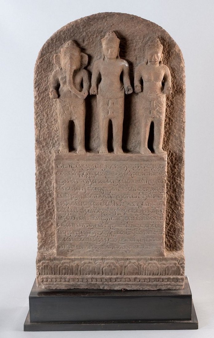 Relief plate with three deities, Cambodia, the Khmer An: Relief plate with three deities, Cambodia, the Khmer Angkor period (12th c. AD), reddish-yellow sandstone, hand carved with fine details. The top half of the plastic representation of deities (left to