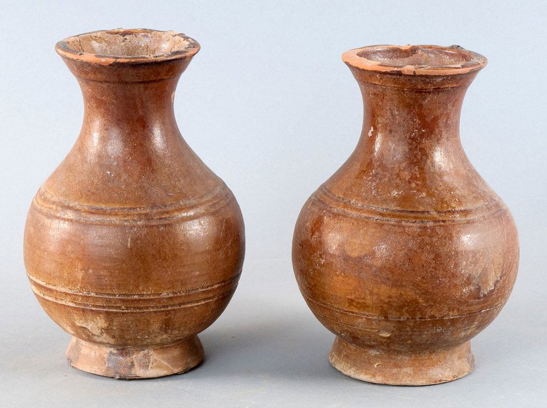 Miscellany of two round vessels , China, Han Dynasty: Miscellany of two round vessels , probably belonging together , China, Han Dynasty ( 206 BC to 220 AD . ) , Brown earthenware with a brownish glaze , these exfoliated in the mouth region partially , t