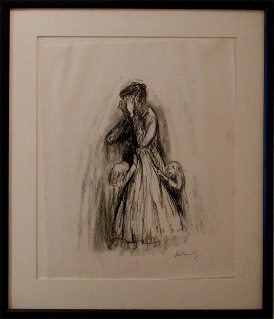 After Kathe Kollwitz (American 1867-1945): "Mother and children", 22 x 18 inches, charcoal on paper, signed lower right.