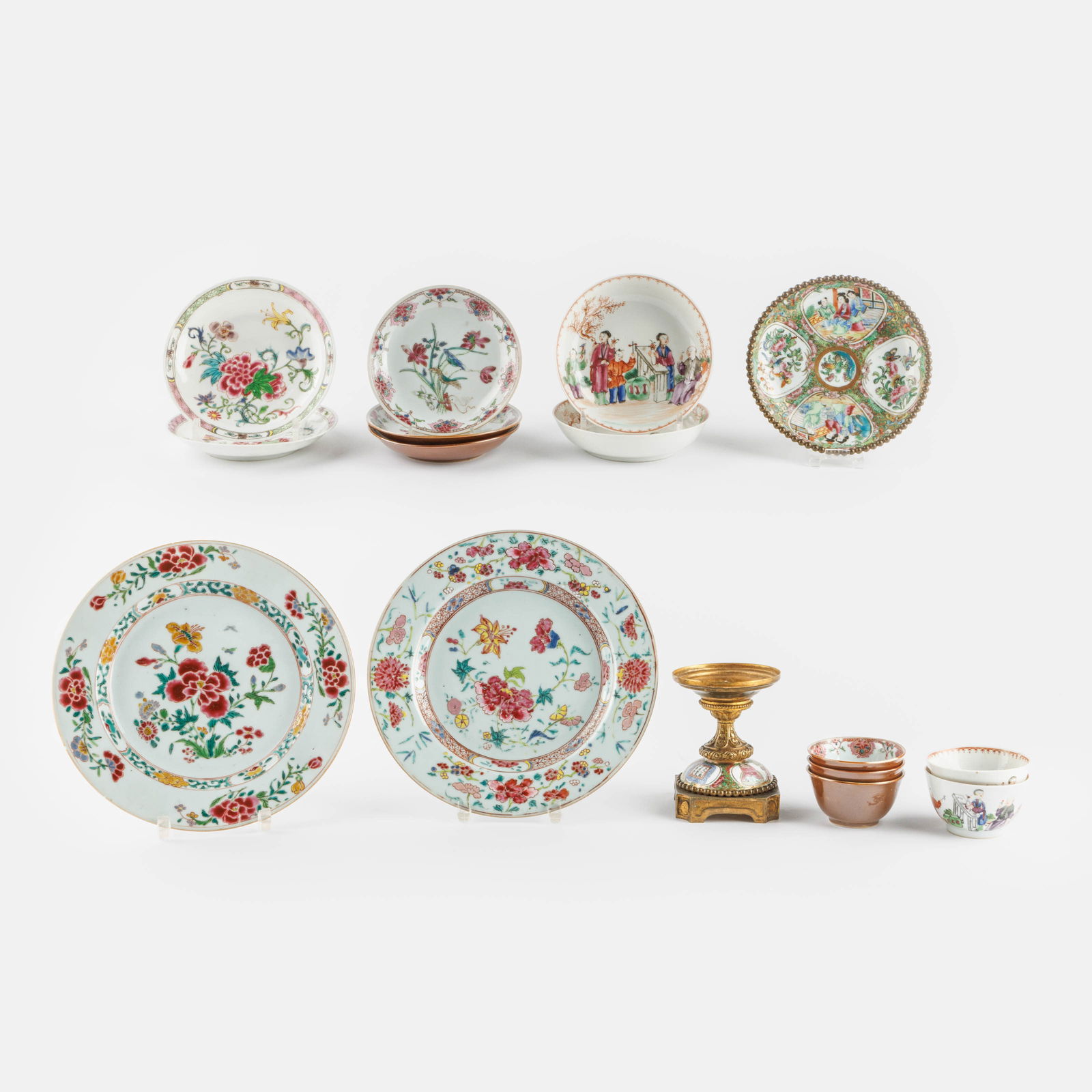 Lot 18th-century Famille rose porcelain.
Two plates, two cups and saucerts, three cups and saucers, (1 of 7)