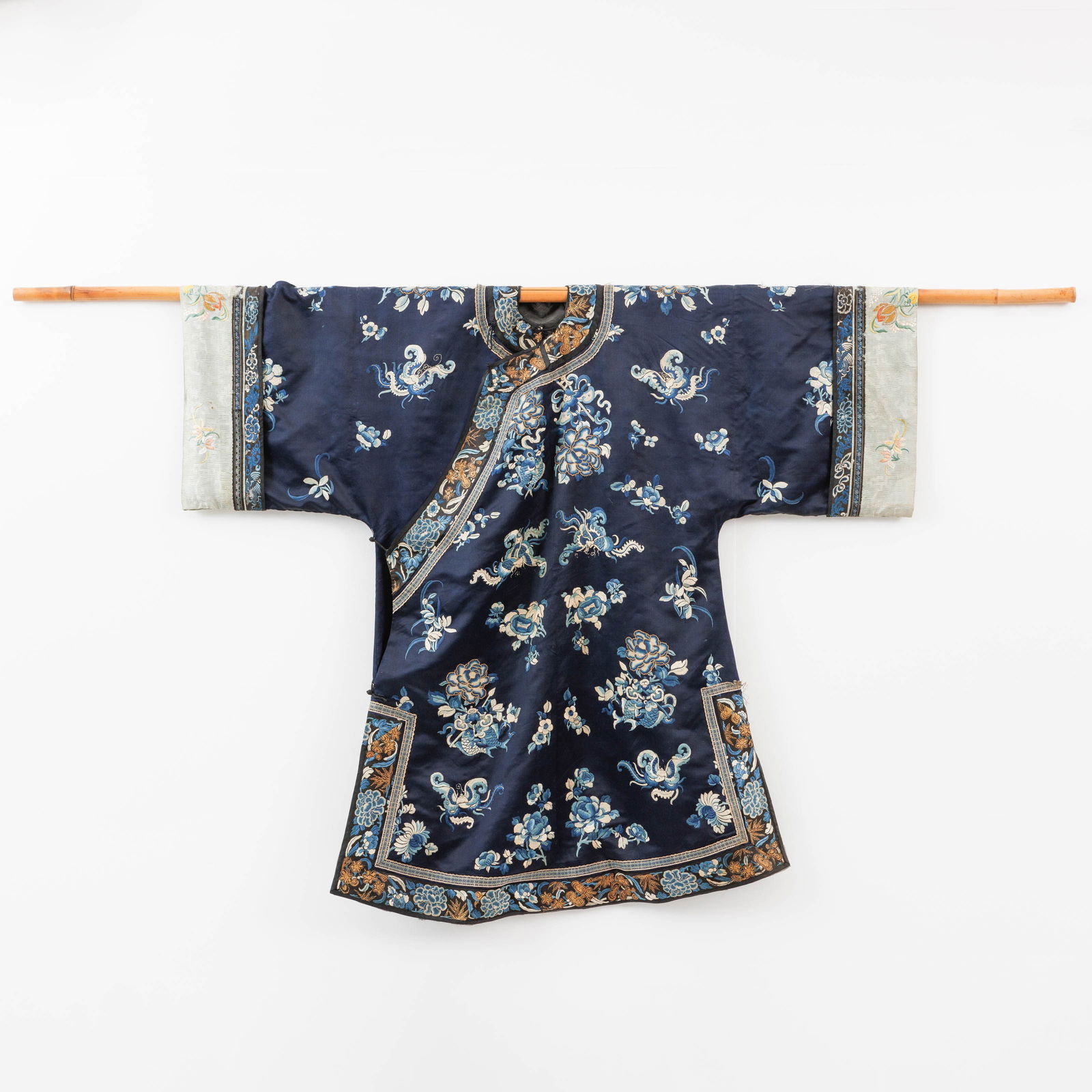 A 19th-century Chinese Kesi robe. 
Dark blue and gray-green coloured silk. White, gray, gold, light- (1 of 7)