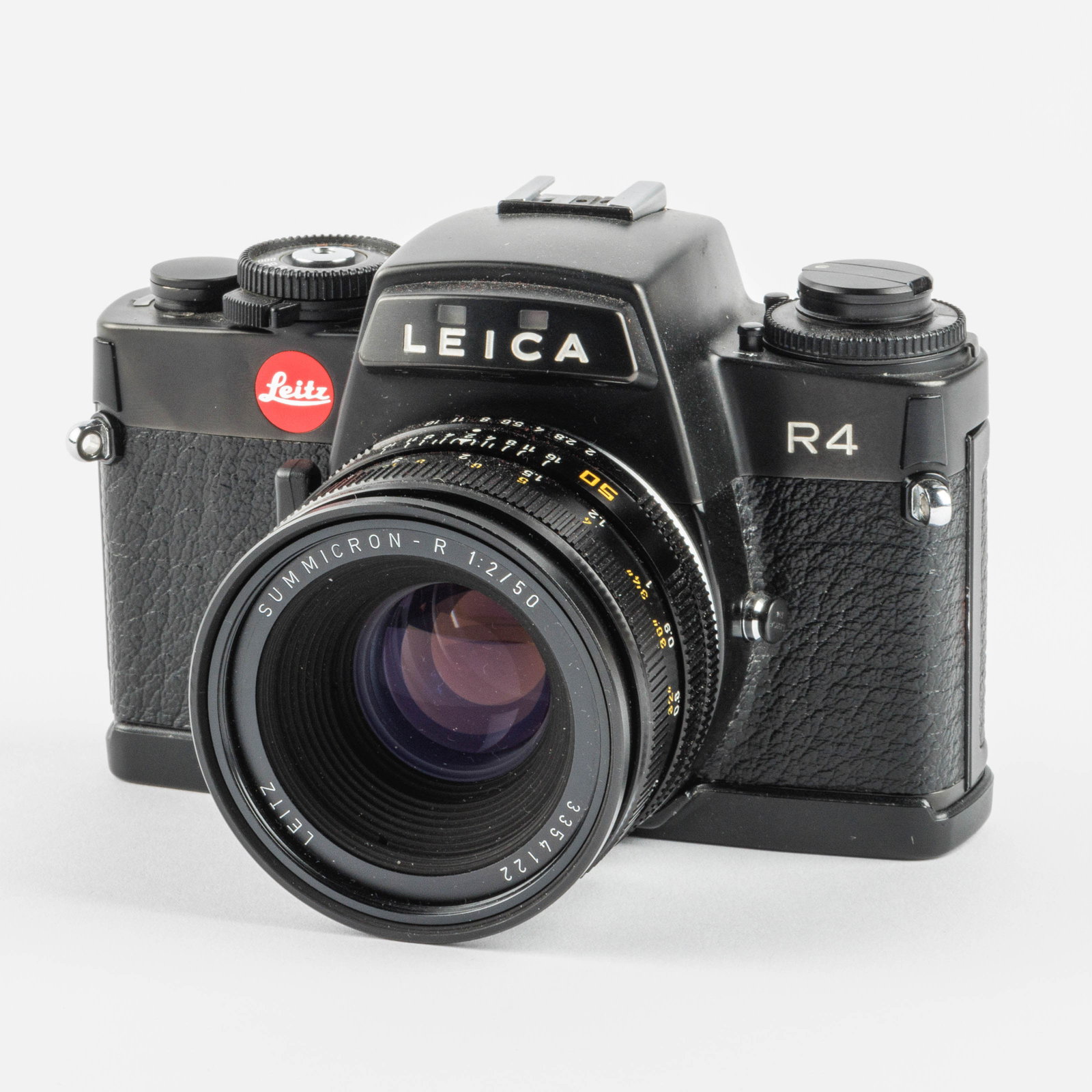 Leica R4, No. 1598238. With Sumicron lens 1.2 x 50mm, No. 3354122.: Description ENLeica R4, No. 1598238. With Sumicron lens 1.2 x 50mm, No. 3354122.Beschrijving NLLeica R4, Nr. 1598238. Met Sumicron lens 1.2 x 50mm, Nr. 3354122.Description FRLeica R4, Nr. 1598238. Ave
