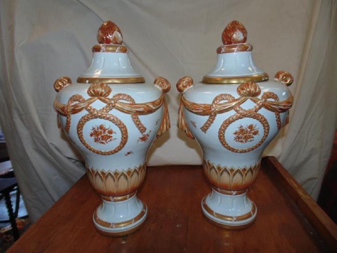 Mottahedeh Italian Urns: Pair of signed Mottahedeh Italy urns. 16" tall. Some chips on interior rim of one urn see photo