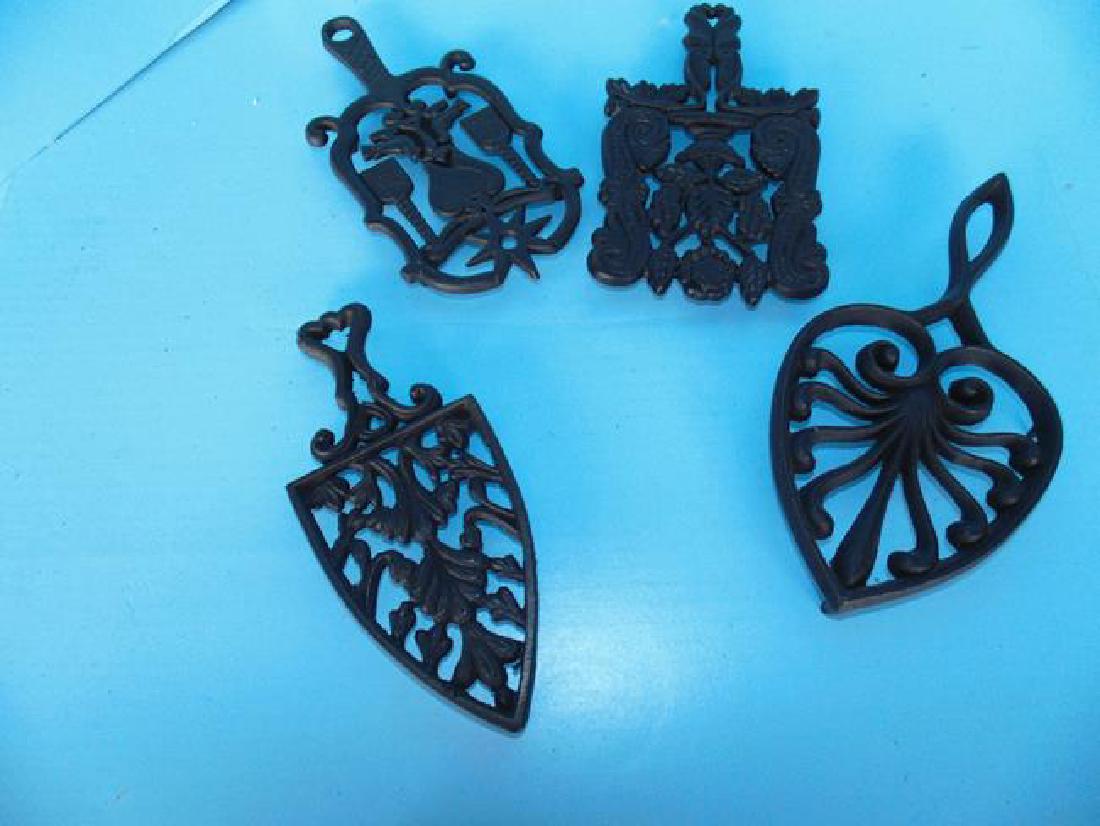 Trivets: 1950's Cast iron trivets.