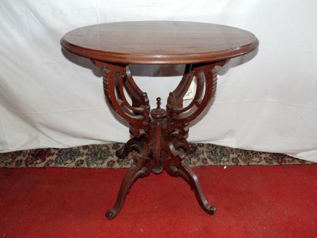 Walnut Oval Table: Walnut Victorian oval 26" x 19" x 26" tall.