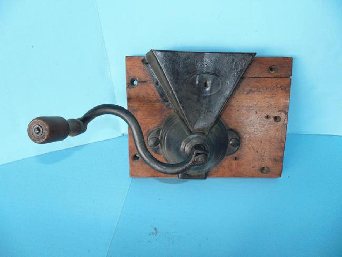 Coffee Grinder: Wall Mount coffee grinder.