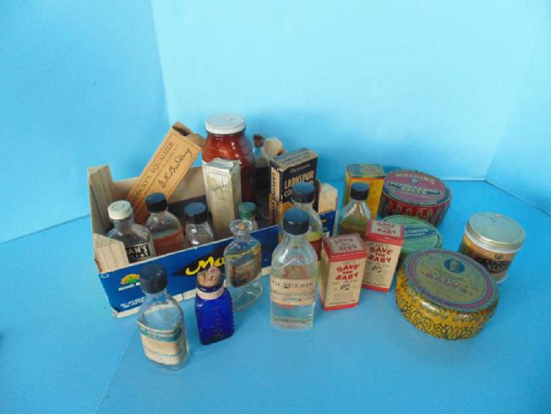 Medicine Bottles & Tins: Group of medicine bottles and tins.