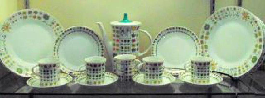 Rosenthal Germany Emilio Pucci Dish Set: Rosenthal German Emilio Pucci dishes including Coffee Pot and lid, 4 cups and saucers, creamer, 4 8" plates and 5 10" dinner plates. Condition: One chip on bottom of one cup see photo. Everything else