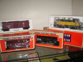 Limited Edition Lionel Train Set 18921 Engine Box: Nickel Plate Road Caboose with Illuminted Interior and Smoke Stack 6-17612, Pennsylvanis Box Car 6-51401, Archie Daniels Midland Uni Body Tank Car 6-17905, Chicago & Northwestern 2 Switch Engine 6-189