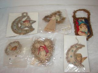 Dresden Christmas Ornaments : 2 Santa Claus, 3 Angels, & one child. Very good condition.