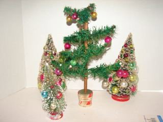 Christmas Trees: Group of 4 Christmas Trees. 3 Brush Trees with Ornamnets and a Feather Tree with a few glass balls. Good condition