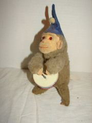 German Wind Up Monkey Toy Velvet Face, Glass eyes,: Velvet Face, Glass eyes, cloth body. Working. Monkey holds drumsticks and beats drum.