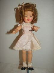 Ideal Shirley Temple Doll Marked St-12-N. Pink S: Marked St-12-N. Pink Sundress. One eye closes. Good Condition