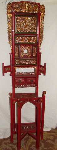 Oriental Tall Fretwork Stand: Ornate red lacquer stand. Very good condition.