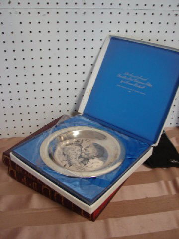 Sterling Silver Rockwell Plates: Group of 3 Christmas Plates 1971, 1972, 1973. Each with a Norman Rockwell engraving. Each sterling silver plate weighs 7 ounces. Very good condition.