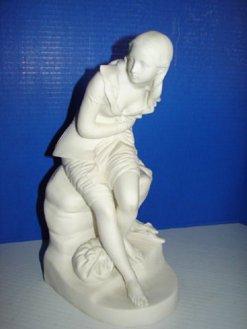 Parian Figure of "Dorthea" by Minton: Signed Minton parian 13 1/2" figure of Dorthea. Flake in back of figure (see photo). Very good condition.