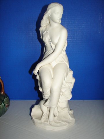 Parian Figure of "Miranda" signed Minton: Parian figure measures 15 1/2" tall. Marked Minton and also signed Bell. Very good condition.
