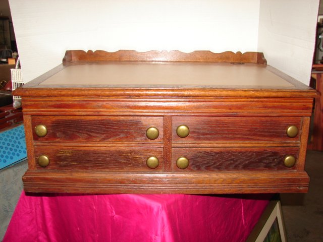 JP Coats Oak Spool Cabinet: Cabinet measures 30" wide by 14" tall. 3 sided backsplash. Decal on back. Brass pulls. VEry good conditoin.