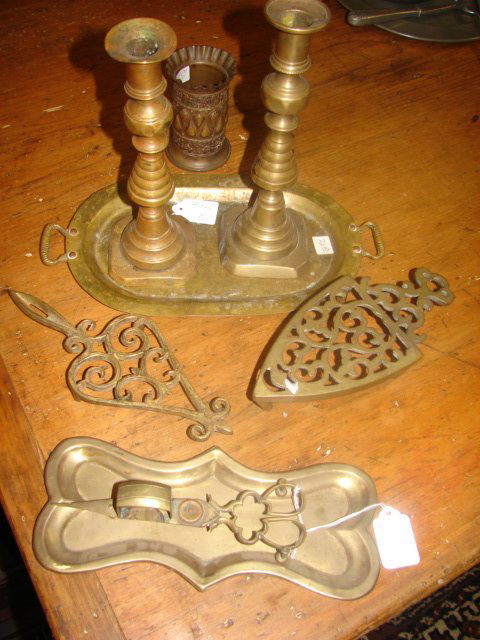 8 Piece Group of 18th & 19th C Brass: Group of 8 items including 2 trivets, candlesticks, candle nippers, tray, etc. Very good condition. .