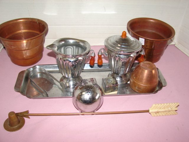 Group of Chase Chrome items: Group of signed Chase chrome and 2 copper planters. Creamer and sugar with bakelite drop handles Some pitting. Good condition.