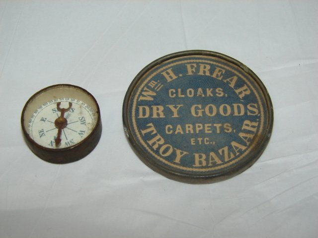 Viintage Advertising Mirror and Compass: Dr. Scott's Electric Brush small compass and Wm H. Frear Dry Goods Troy Bazaar Mirror. Both in very good condition.