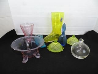 Group of Colored Glass Items: Including a Pilgrim Boot, 2 yellow covered dishes, Czech Blue perfume bottle, clear glass bottle and green cambridge bowl. VEry good condition.