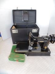Featherweight Sewing Machine: Model 221 Feather Weight Sewing Machiine in Case with book. Very good conditon.