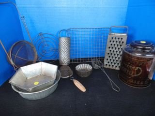Old Kithcen Utensils including 2 Wire Trivets: Strainers, graters, 2 Wire Trivets, Coffee Tin, molds, etc.
