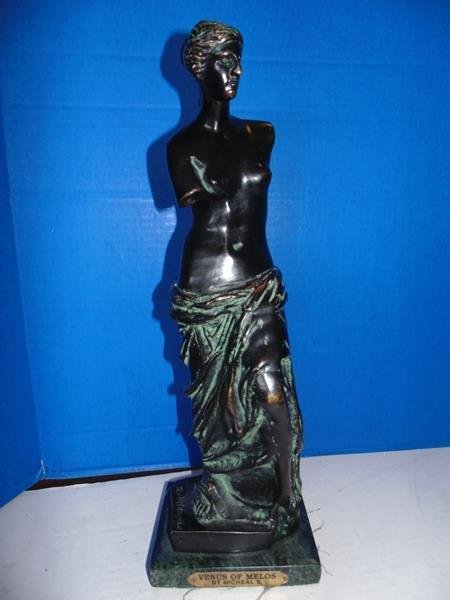 Bronze Statue of Venus de Milo: 17" tall bronze figure mounted on marble base. Plaque on front of marble base. Very good condition.