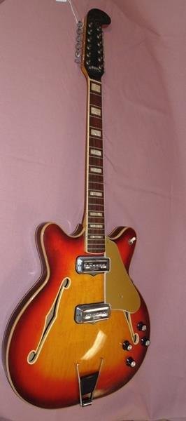Fender 1967 Coronado Guitar: Fender 1967 Coronado Guitar XII. 12 string guitar. Marked Special on the back of the head stock. #181550. Sunburst. All original. Missing parts of bridge. Other than that very good condition.