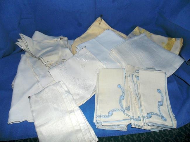 Group of Vintage Linen Napkins: Sever sets of napkins some 12's and a few with sets of 2. Also included are 2 sets of linen placemats with matching napkins. Look to be in good condition.