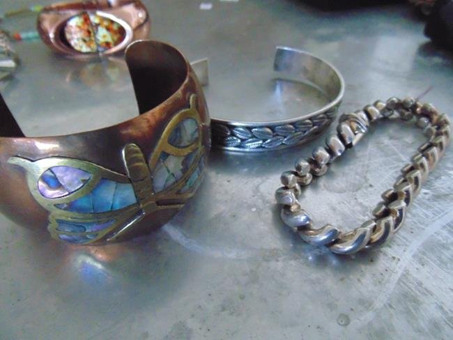 Costume Jewelry & Sterling Bracelets: Group of costume jewelry, bracelet marked 925 Italy, bracelet marked 925 and one marked Neocheon Mexico with an abalone butterfly. Very good condition.
