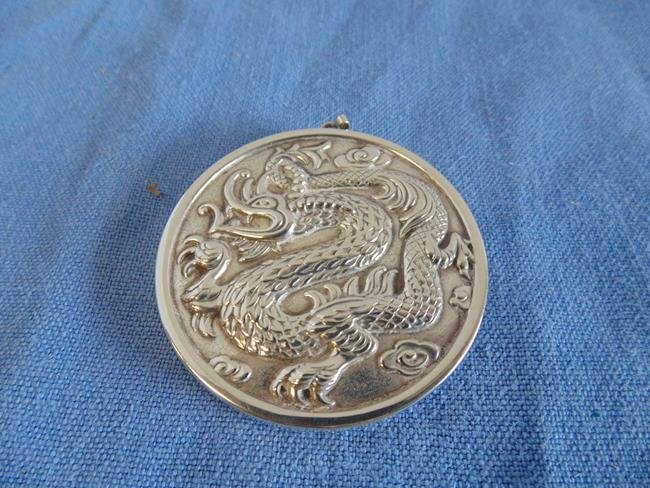 Sterling Silver Dragon Medallion Mirror: Reed & Barton Sterling Medallion with Dragon on one side and mirror on the other. Very good conditoin.