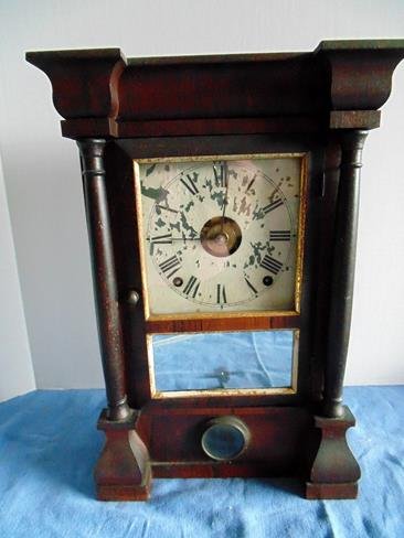 Rosewood Seth THomas Column Clock: Rosewood clock by Seth Thomas. Good condition.