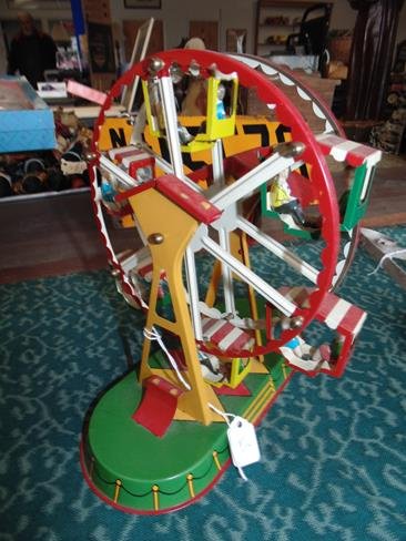 German Tin Litho Wind Up Ferris Wheel: German tin wind up Ferris wheel. 9" tall. 1970's.