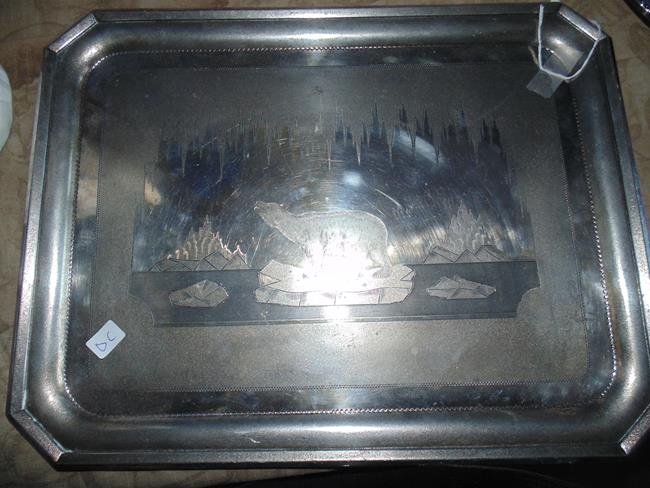 Silverplate Polar Bear Tray: Roger Smith & Co. Silverplate tray depicting a polar bear floating on an iceberg. 16"x13".