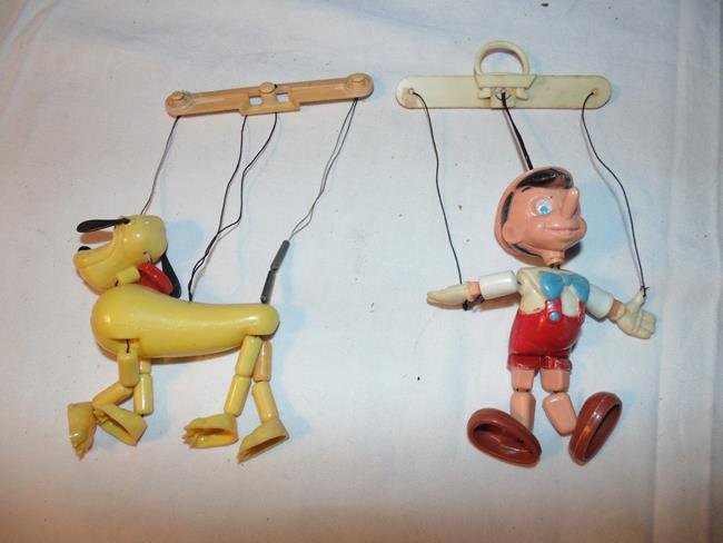 Walt Disney Pluto & Pinochio Figures: 2 viintage Walt Disney Production Plastic Marionette figures Very good conditon