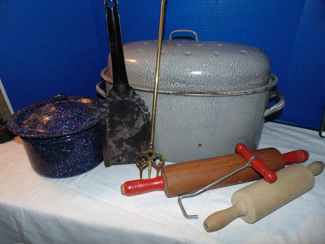 Kitchen Ware: Large agateware roaster, rolling pins, agateware covered pot, coal shovel, and brass turning fork with figural head.