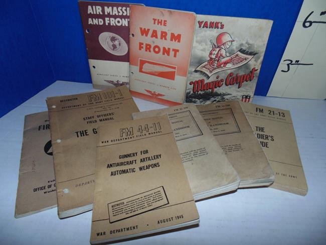 Military Handbooks: Group of 9 Military Handbooks including Aircraft Artillery, Soldiers Guide, Firld Manuel